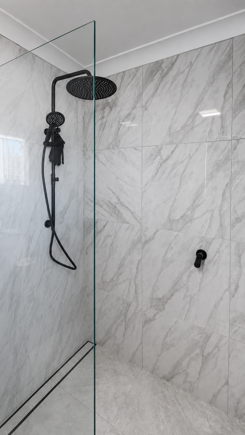 Completed ensuite main waterfall shower with linear floor drain
