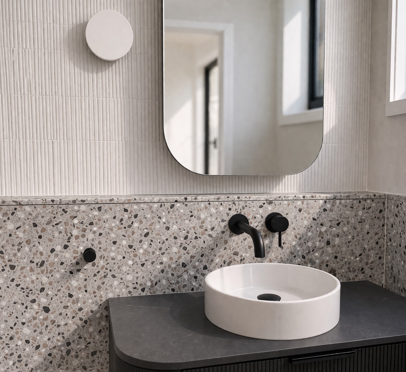 Completed ensuite bathroom curved vanity and mirror detail