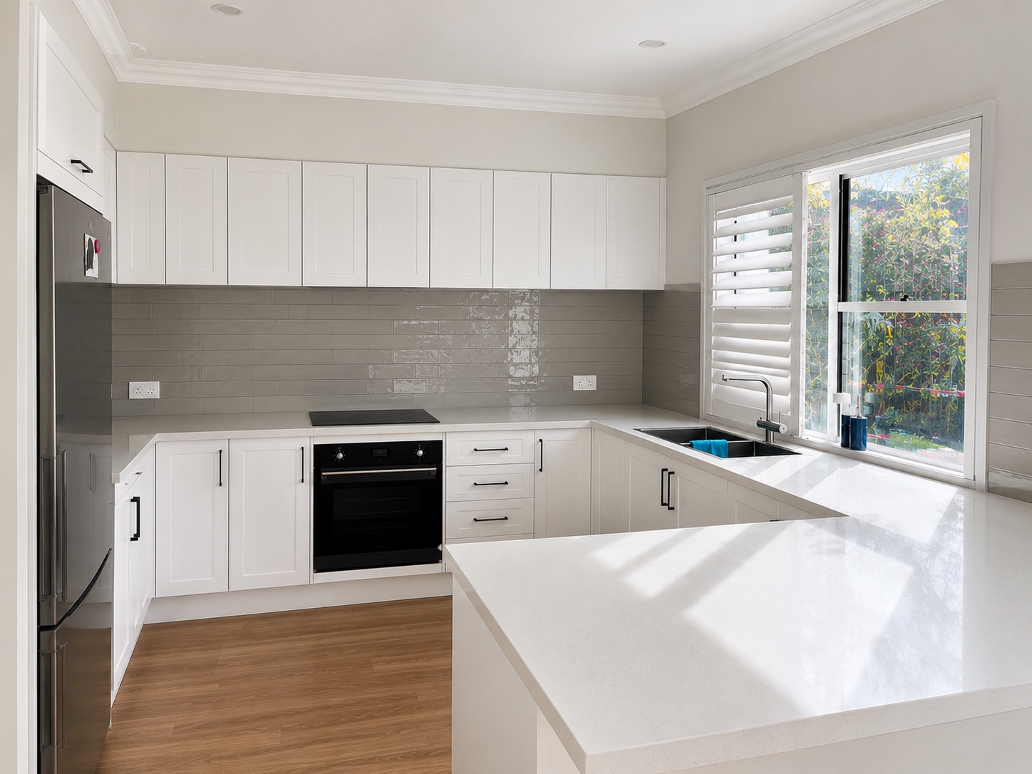 Completed functional Coastal Hamptons kitchen with grey splashback